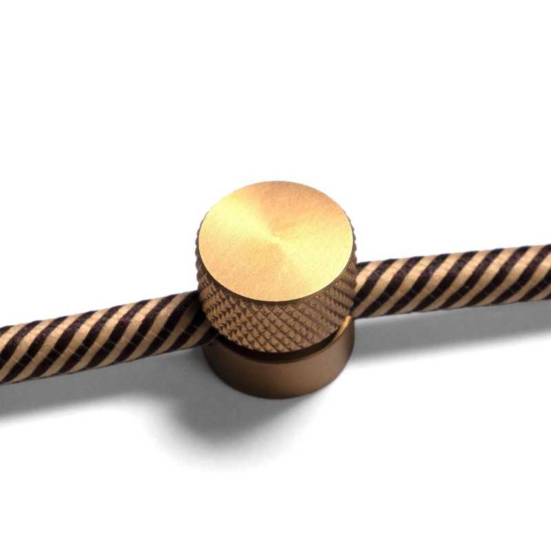 Metal cable grommets for walls and ceilings