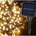 Solar garland with 560 warm LED lights, 11 meters long, programmable for outdoor use.