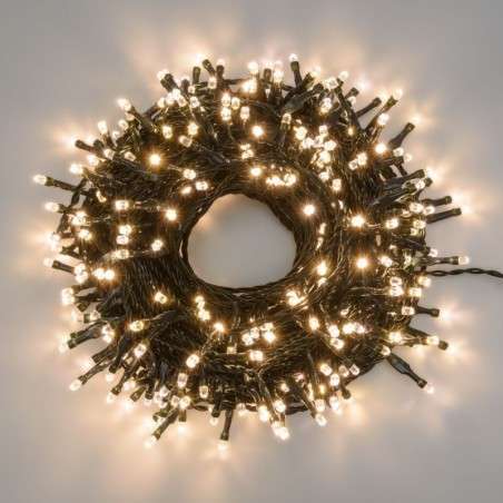 String of 100 warm white connectable LED lights, 6.5 meters long, fixed light, green cable.