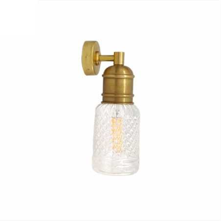 Brass wall light with frosted glass shade