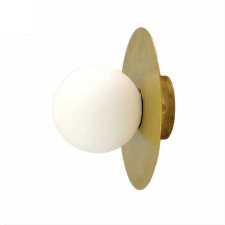 Wall lamp in brass with reflector disc and glass globe