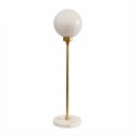 Table lamp with marble base and glass globe