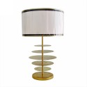 Table lamp with brass discs and textile shade
