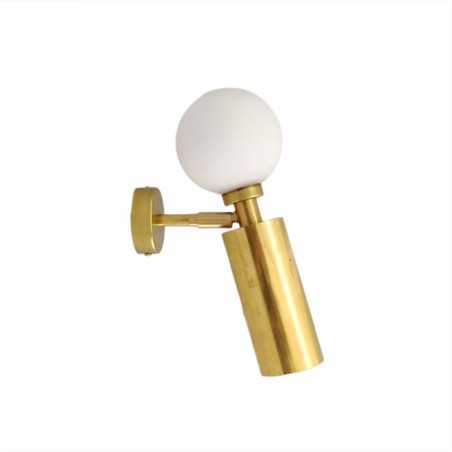 Brass wall sconce with globe and cylinder focus