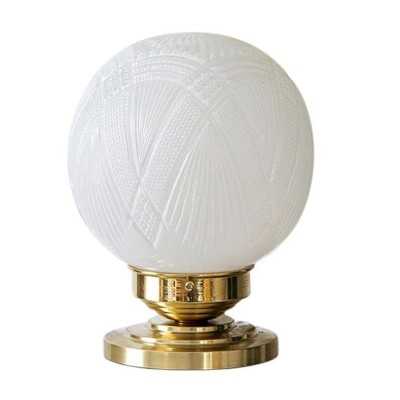 Brass table lamp with glass globe